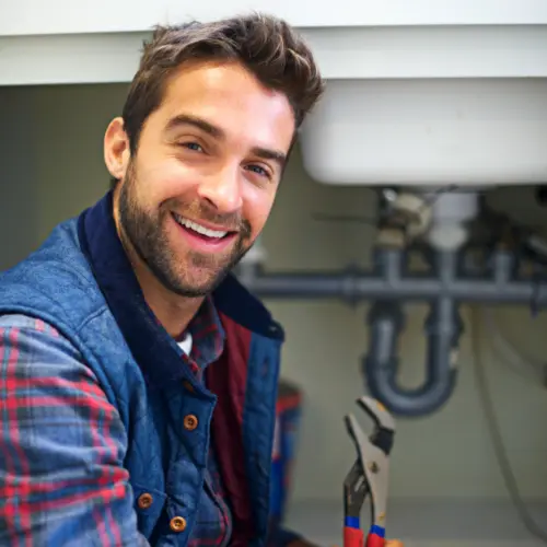 smiling plumber